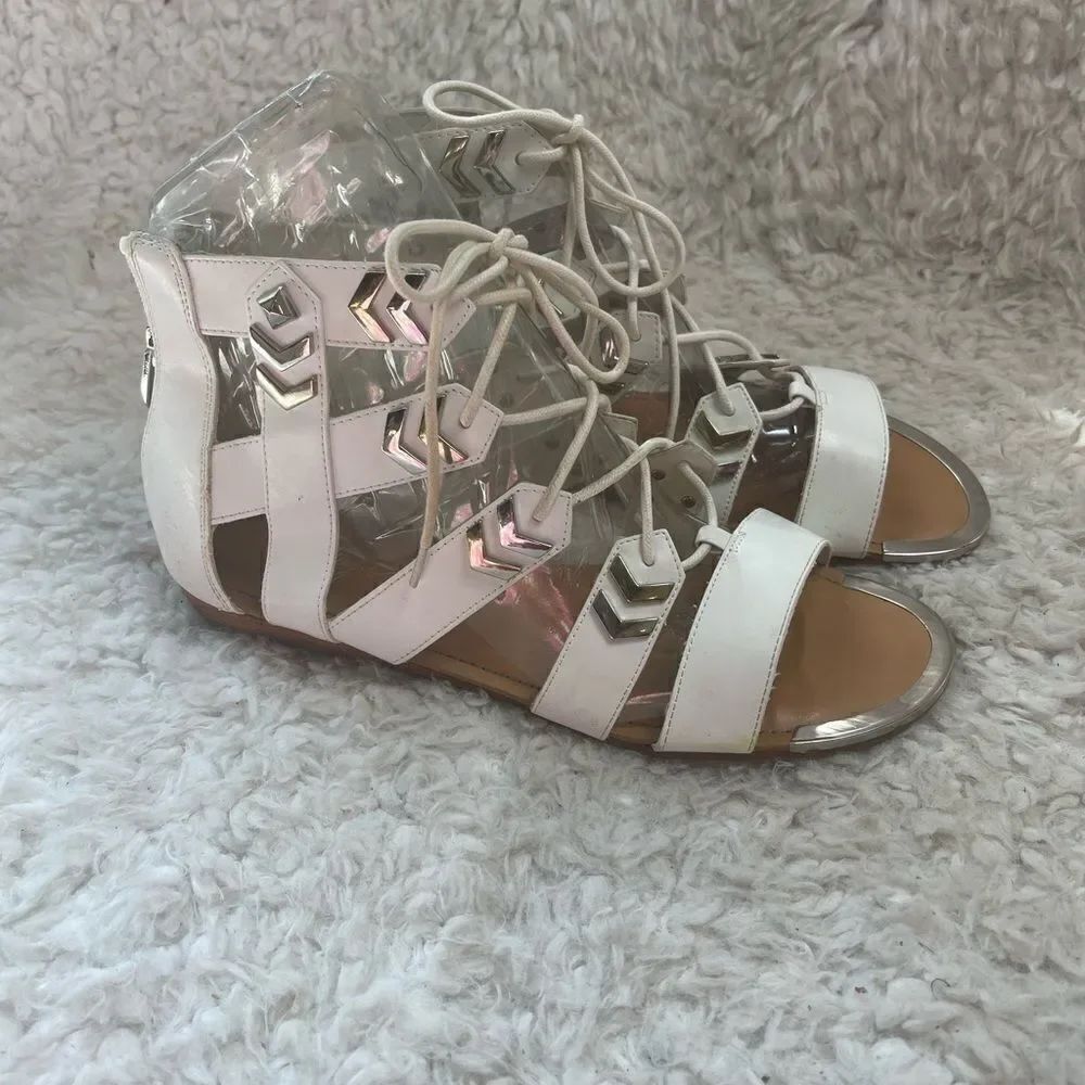 Fergie gladiator synthetic white lace up sandals with silver tone accents SZ 10